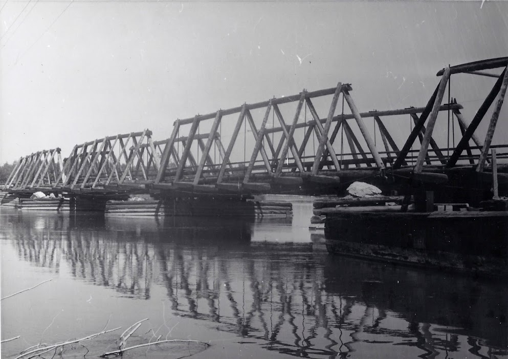 The first, last, and only short lived Holt Bridge on top of the site of the Holt ferry. Credit - Kellogg Collection